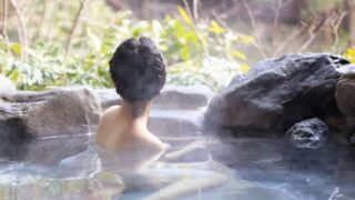 japanese women feeling relax, calm in natual hot spring and creating pleasant experience