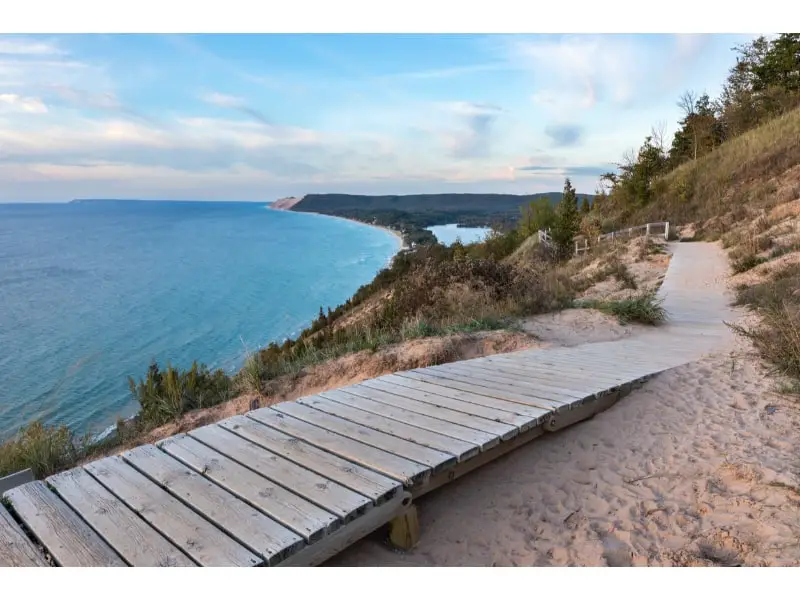 The wooden path at Empire Bluffs Trail in Lake Michigan is making the look of Sleeping Bear dunes more aesthetic at the Manitou Island