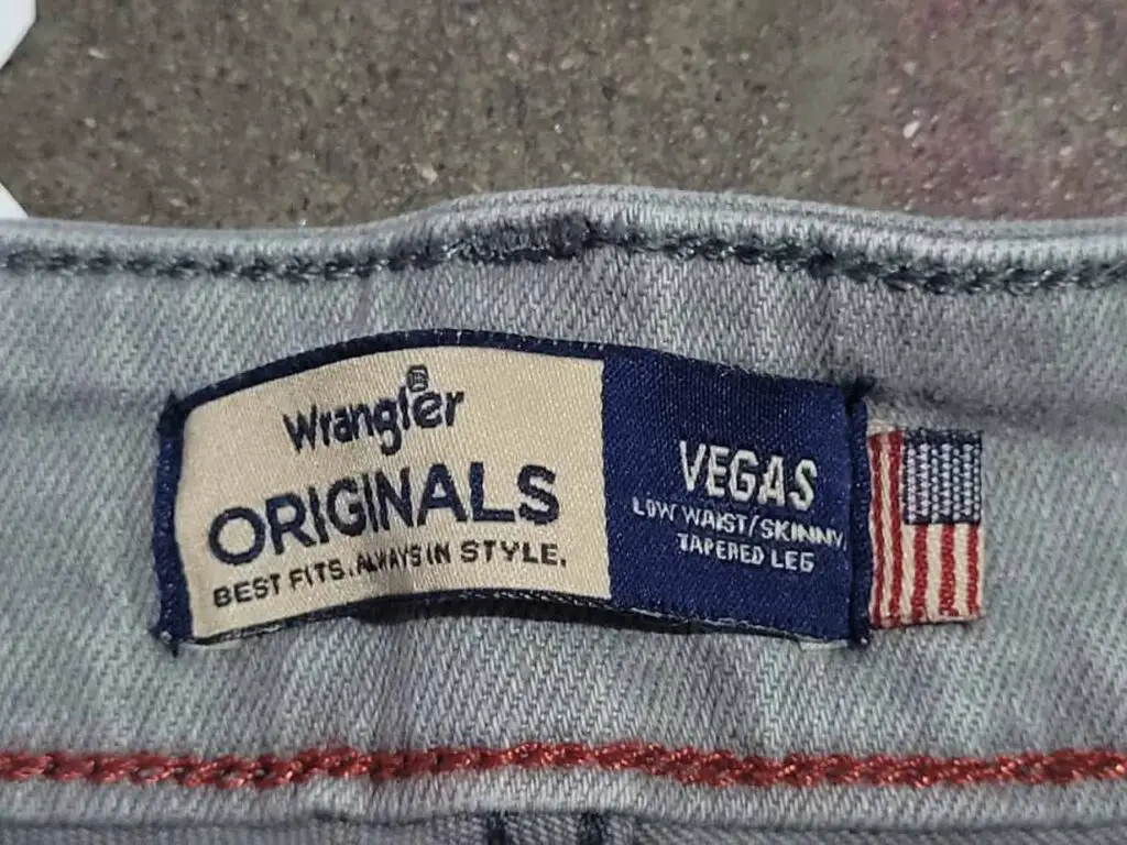 original wrangler jeans have a USA flag under waistband.
