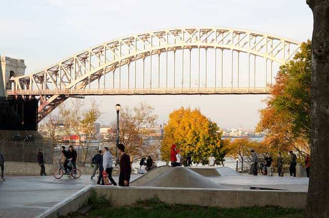 Astoria park with a curved bridge in queens of new york