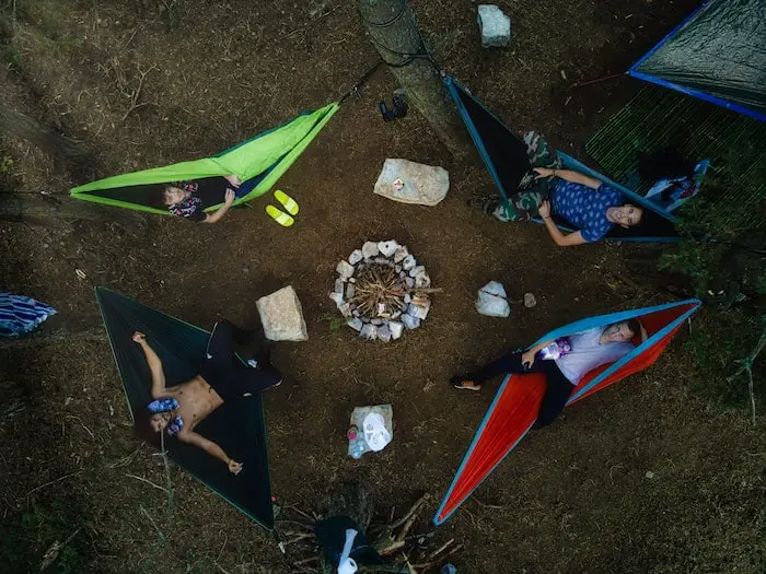 a group of people hanging comfortable in hammock
